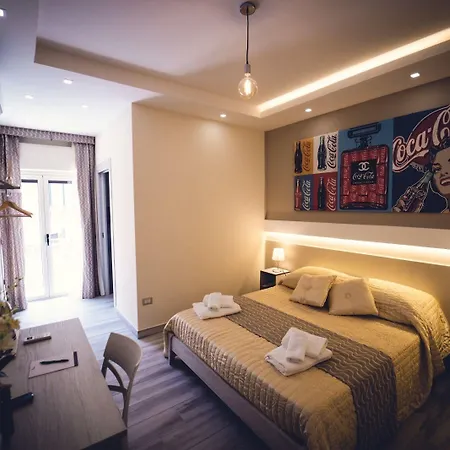 לינה וארוחת בוקר In Centro 4*